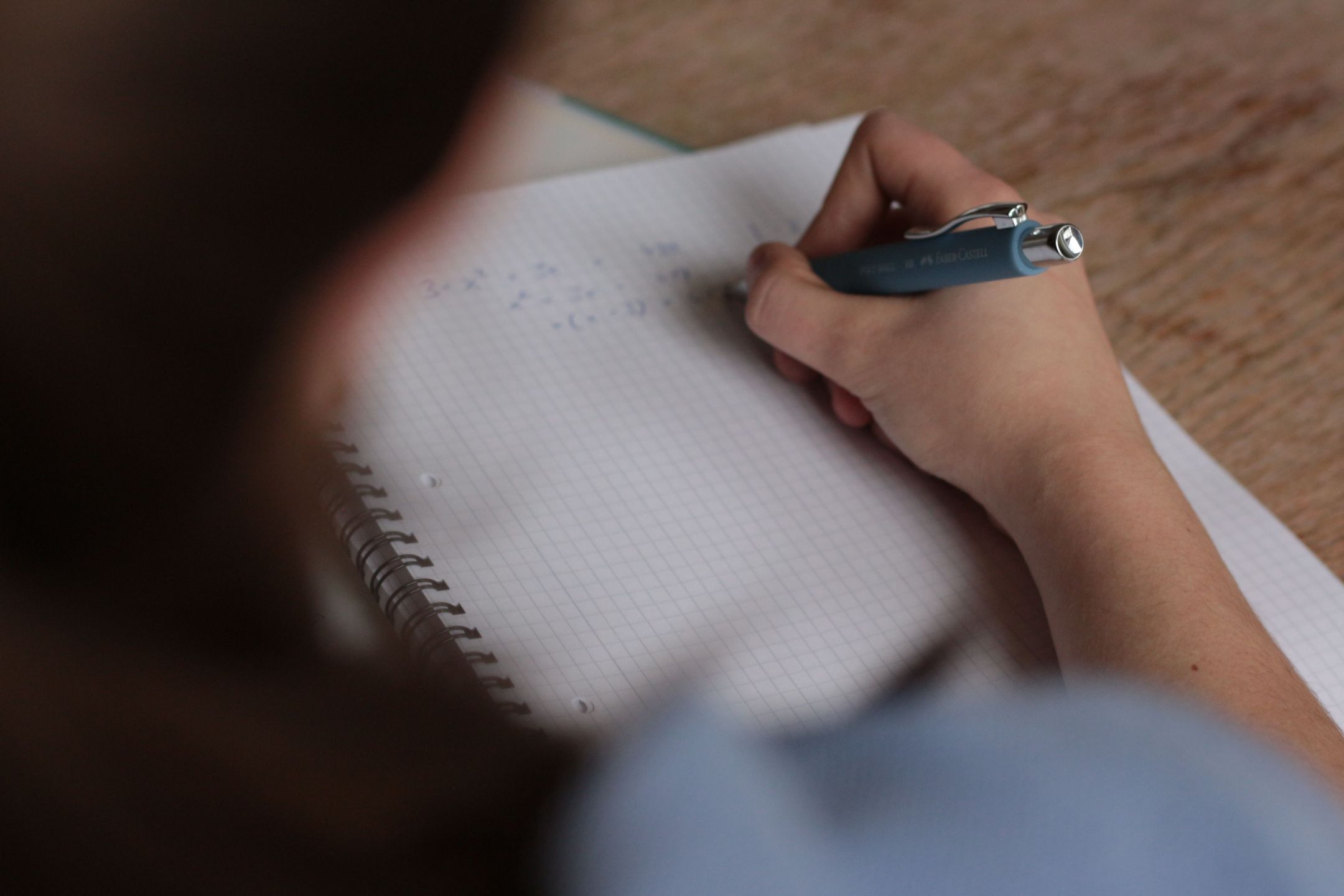 student-practising-equations